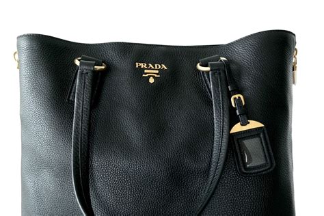 prada side zip tote|prada daino leather tote.